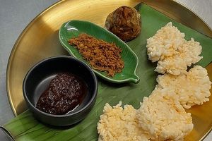 Puffed rice crackers served with chilli jam, piquant galangal floss, and fermented mushroom cakes at Noodles Now in Koh Samui