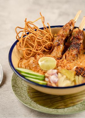 Khao Soi style Red Curry Soup Noodles with Mian Jin Kebabs at Noodles Now in Koh Samui