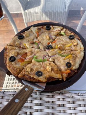 Hawamahal special pizza with cashew cheese  at The Tattoo Cafe and Lounge in Jaipur