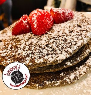 Buckwheat Pancakes

topped with powdered sugar and various options like : banana, strawberries and plant-based chocolate chips. at Izenberg's in Conshohocken
