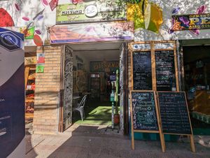 Front from the street. More than one restaurant inside the area at Yizak Vegan Food in Santiago