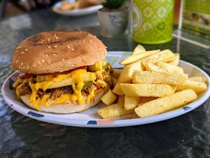 Ben Cheese burger that comes with fries at Yizak Vegan Food in Santiago