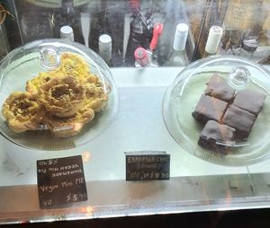 display of savory vegan pies and brownies at The Living Story Cafe in Enmore