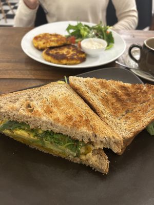 Chickpea fritters and toasted pumpkin, avocado, hummus sandwich  at The Muffin Man in Siem Reap