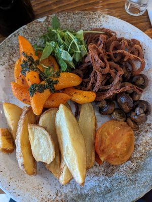 Vegan squash steak plus sides including tobacco onions at The Snooty Tavern in St Neots