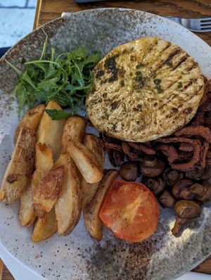 Vegan celeriac steak plus sides including tobacco onions at The Snooty Tavern in St Neots