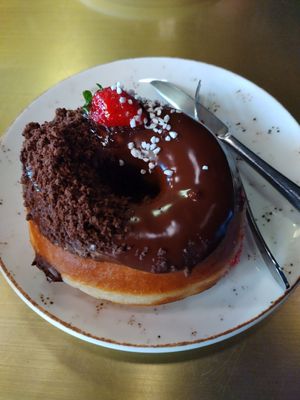 Chocolate doughnut at Holy Donut - Vilniaus in Vilnius