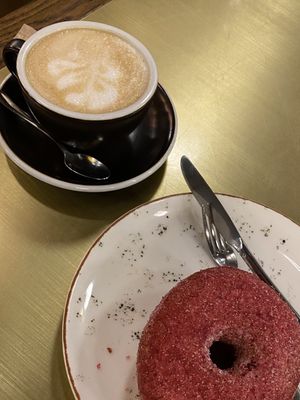 Raspberry&cranberry doughnut and almond milk cappuccino   at Holy Donut - Vilniaus in Vilnius