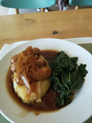 Vegan sausage, mash and greens with onion gravy. £12. at Crofters Cafe in Truro