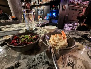 The bar with beetroot poke and kimchi potato salad at Wild Orange in Honolulu