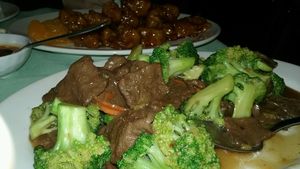 ";beef"; broccoli on fore ground and orange ";chicken in back ground at Veggie House in Las Vegas