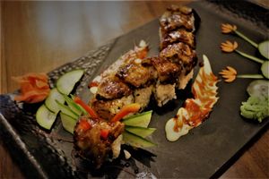 Fiery Dragon Roll. One of Chef Lee's specialty roll with Eggplant in unagi sauce. at Veggie House in Las Vegas