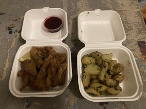 schnitzel with potatoes and sauce at Let‘s be Frank in Vienna