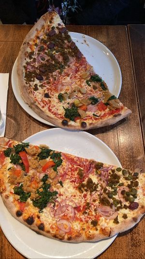 Pizza with vegan tuna // pizza with vegan chicken. Both tasty but nothing super special. Tuna tasted better than chicken  at L'Osteria in Kassel