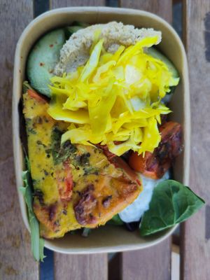 Farinata with salad lunch box at Herbivore Vegan Deli in Bristol