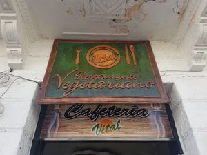 Sign above the door at Vital in Santa Marta