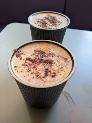 Dirty chai and hot chocolate, both with oat milk at Foodstory in Edinburgh