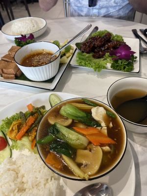 Tofu satay, ribs, rice side and mixed vegetable tofu and rice dish. Soup came as appetiser   at Voila in Kuala Lumpur