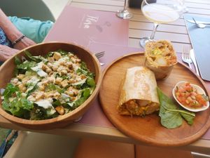 Breakfast burrito and Caesar salad at Flora Vegan Cafe in Tamarindo