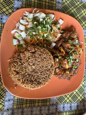 Aww Jollof rice done right! 😋  at Assase Pa - The Earth is Good in Accra