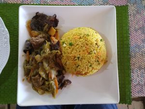 Turmeric rice at Assase Pa - The Earth is Good in Accra