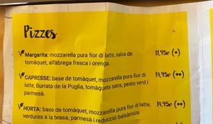 Three vegetarian pizzas than can be made vegan. at El Petit Obrador in Girona