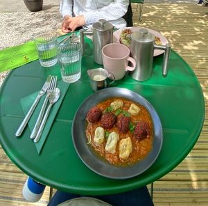 Home-made gnocchi with lentil balls. Coffee with soy milk.  at Pulse in Edinburgh