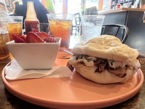 BBQ Jackfruit Sammy (featuring vegan coleslaw!) with fruit side.  at Blue Moon Cafe in Fayetteville