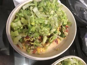 Guac time burrito bowl- no rice, no bean, veggie fajita, no extra protein, pico de gallo , Mexican corn, spicy salsa, guacamole , romaine lettuce, no sauce,   at Guac Time in Hicksville