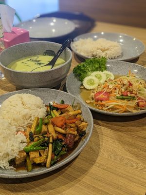 Mixed vegetables with besil, papaya salad, vegetable spicy green curry at Namaste Vegetarian in Phuket