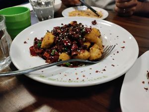 Mostly a plate of fried chili with a few pieces of chikin at Tofu Vegan - Spitalfields in East London