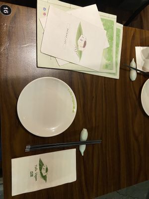 Place setting and menus  at Tofu Vegan - Spitalfields in East London