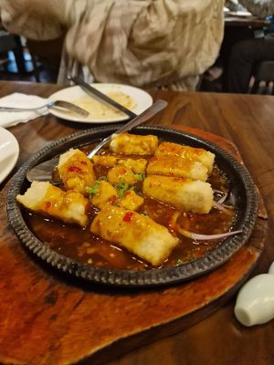 Sizzling tofu in house special saucee  at Tofu Vegan - Spitalfields in East London