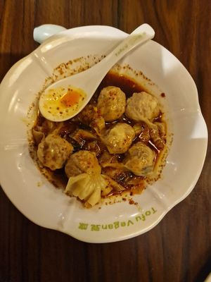 Wontons in house special saucee  at Tofu Vegan - Spitalfields in East London