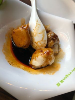 Chengdu vegetable dumplings in a spicy sauce at Tofu Vegan - Spitalfields in East London