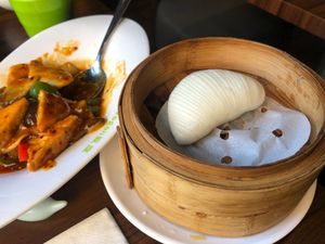 Mushroom tofu dish and a bao bun at Tofu Vegan - Spitalfields in East London