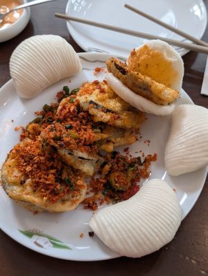 Fried aubergine with house special sauce at Tofu Vegan - Spitalfields in East London