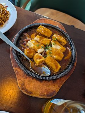 Sizzling tofu in house sauce at Tofu Vegan - Spitalfields in East London