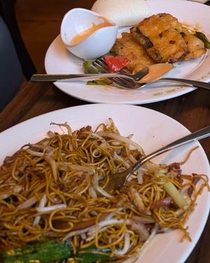 Special fried noodles and twice cooked fisc at Tofu Vegan - Spitalfields in East London
