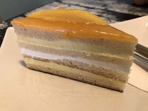 Mango cake - was nice but very sweet not that fruity at Café Allerlei in Trier
