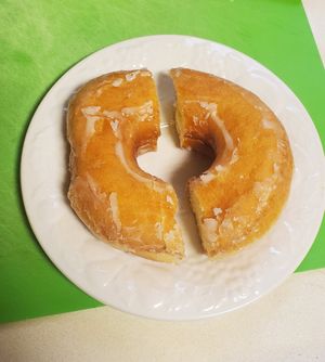 Vegan glazed doughnut (cut in half) at Anna's Marketplace Bakery in Goleta