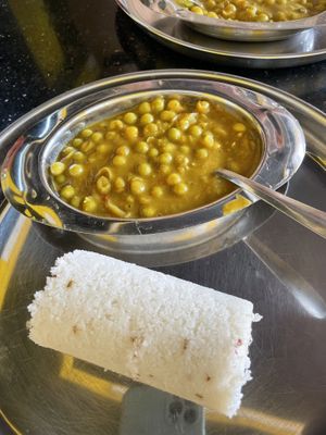 Puttu with peas curry   at Pumpkin Veg Restaurant in Kochi