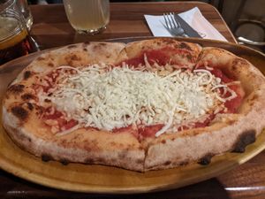 Small plant based 4 cheese pizza (don't worry, the cheese underneath is melted) at Vegitalian Pizza Bar in Utrecht