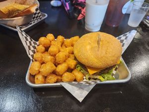 Black bean burger with cheese. Get the garlic aioli sauce! at Vine Vegan in Brandon