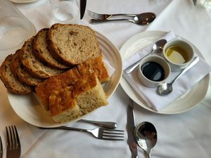 Warm Sourdough and Foccacia served with Balsamic and Olive Oil. at Hotel Portmeirion & Castell Deudraeth in Gwynedd
