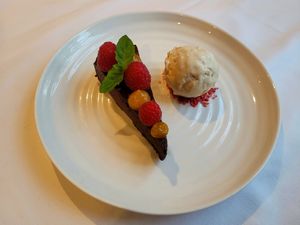 Dark Chocolate and Olive Oil Tart, Honeycomb Ice Cream, Raspberry. at Hotel Portmeirion & Castell Deudraeth in Gwynedd