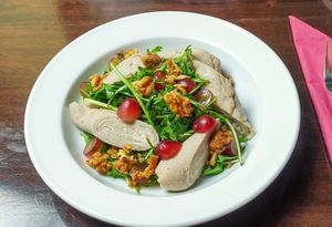 Galette-fresh cheese rolls 8,50
arugula-herb salad with verjus dressing,
juniper walnuts and grapes at Vaust Braugaststatte in Berlin