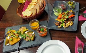 Vesper platter 11,50 (left)
Pumpkin-smoked sausage, coarse soy-mushroom sausageAjvar-cashew-tea sausage, apple-onion lard, marjoram cream, cornichons and fresh bread at Vaust Braugaststatte in Berlin