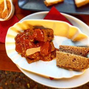 Homemade seitan berliner wurst with warm curry ketchup  at Vaust Braugaststatte in Berlin