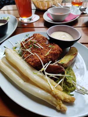 Tempeh schnitzel, pease pudding, potatoes, asparagus and sauce hollandaise made with mungbeans at Vaust Braugaststatte in Berlin